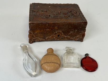 Set of four small glass salt flasks, one...