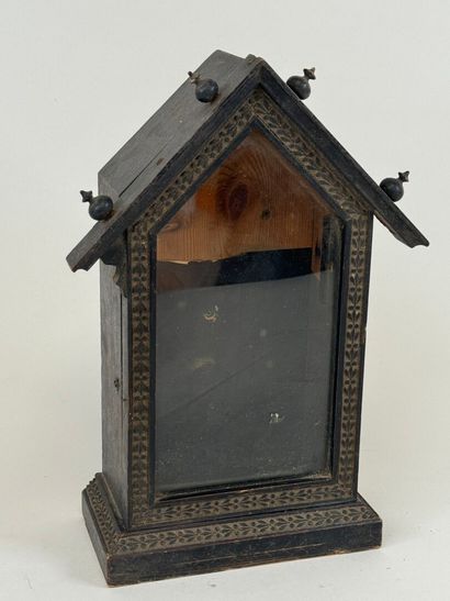 Small display case in blackened wood, triangular...