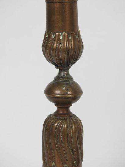 Pair of bronze candlesticks, the vase-shaped...