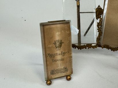 Three chased brass picture frames, two of...