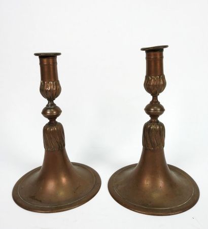 Pair of bronze candlesticks, the vase-shaped...