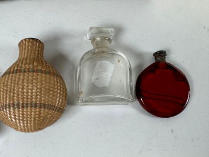 Set of four small glass salt flasks, one...