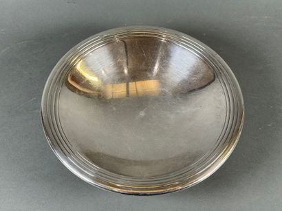Circular bowl on wood and silver-plated metal...