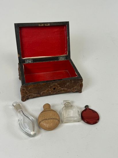 Set of four small glass salt flasks, one...