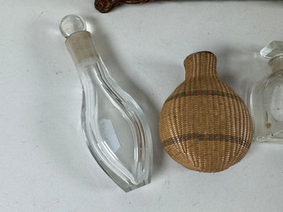 Set of four small glass salt flasks, one...