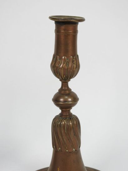 Pair of bronze candlesticks, the vase-shaped...