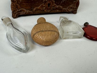 Set of four small glass salt flasks, one...