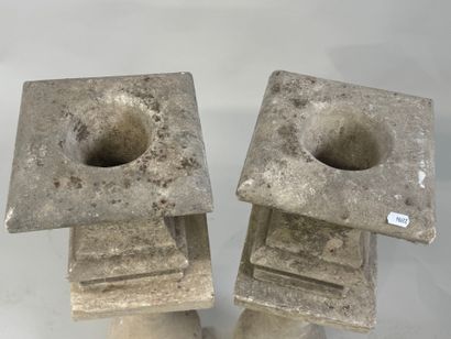 Pair of stone baluster columns, square base.
61...