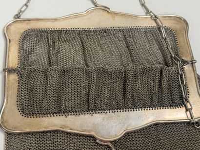 Large silver-plated evening bag with chased...