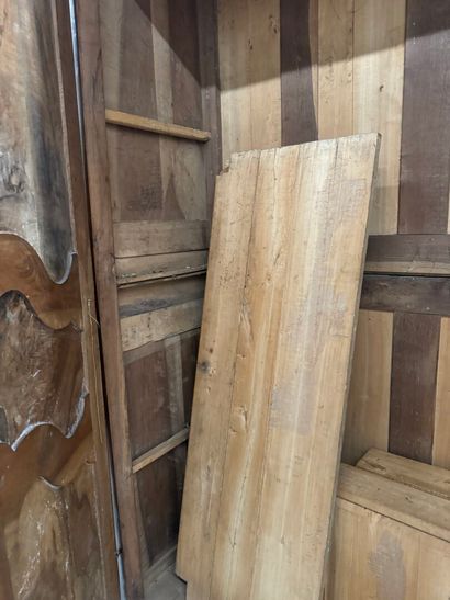 Large walnut armoire opening with two molded...