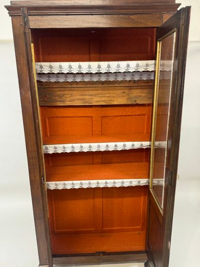 Stained-wood display case opening with two...