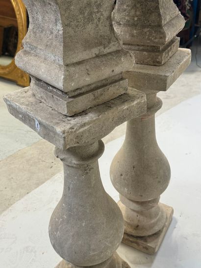 Pair of stone baluster columns, square base.
61...