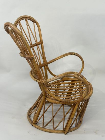 Openwork wicker armchair.
93 x 70 x 60 c...