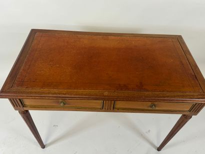 Flat desk in molded wood opening with two...