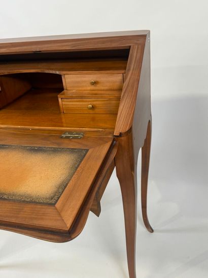 Cherrywood sloping desk opening with a flap...