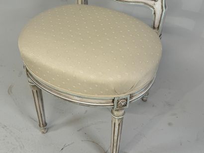Molded wood chair, the back decorated with...