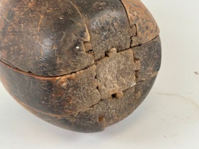 Large wooden puzzle in the shape of a rugby...
