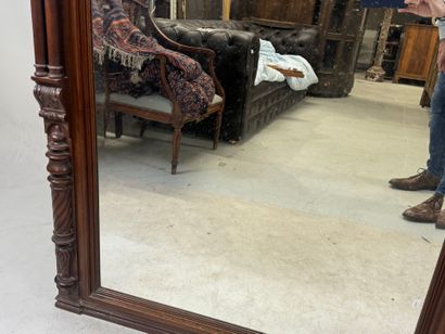Large molded and carved wood mirror with...