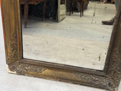Wood and gilded stucco mirror with foliate...