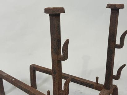 Pair of cast iron landiers.
19th century.
63...