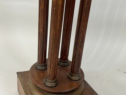 Moulded wood and brass sellette with four...