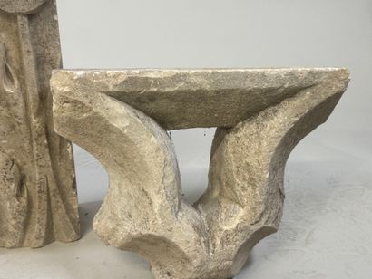 Two stone ornaments, one rectangular with...