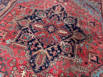 Large hand-knotted wool rug decorated with...