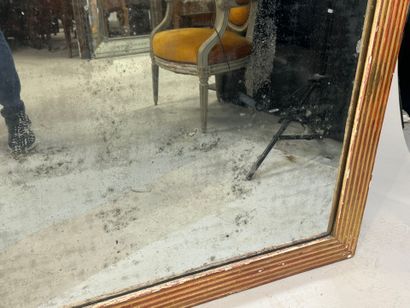 Large rectangular mirror in wood and gilded...