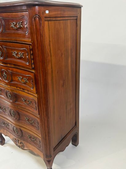 Cherry wood chiffonier opening with six drawers.
Louis...