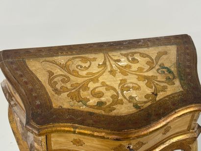 Small molded and gilded wood bedside table...
