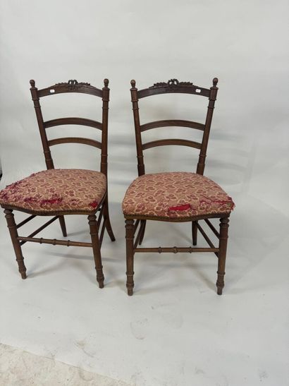 Pair of chairs in molded wood, the openwork...