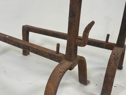 Pair of cast iron landiers.
19th century.
63...
