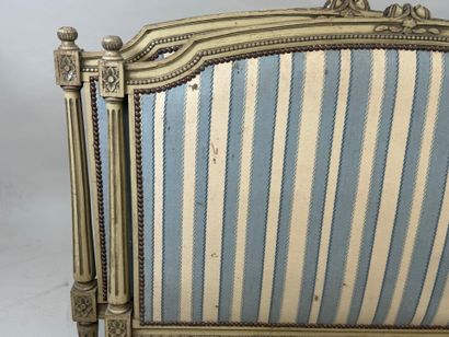 Lacquered, molded and carved wooden bed decorated...