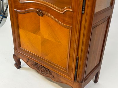 Moulded cherrywood display cabinet opening...