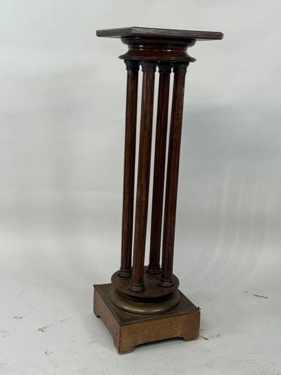 Moulded wood and brass sellette with four...