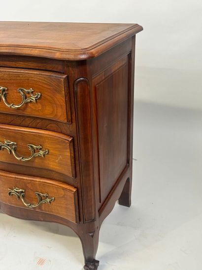 Molded wood chest of drawers opening with...