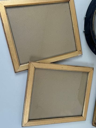 Set of four giltwood and blackened wood frames,...