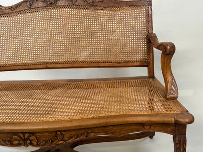 Molded and carved wood bench with leafy shell...