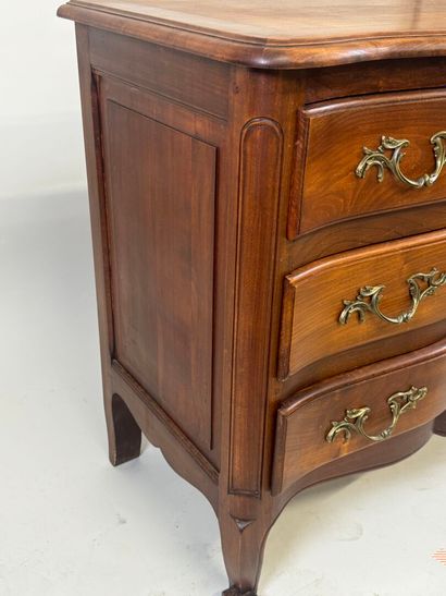 Molded wood chest of drawers opening with...