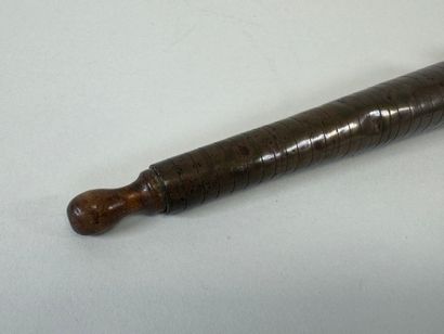 Triboulet en bois tourné et laiton.
L. 21,5...