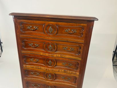 Cherry wood chiffonier opening with six drawers.
Louis...