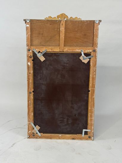 Lacquered and molded wood trumeau decorated...