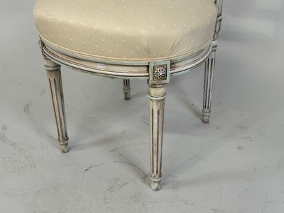 Molded wood chair, the back decorated with...