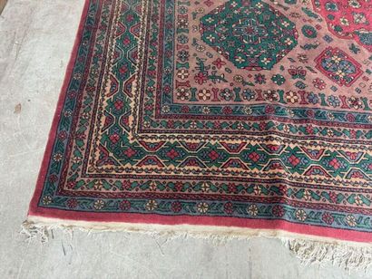 *
Large wool carpet with geometric and stylized...