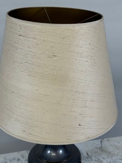 VIETNAM, 20th century.
Pewter and brass lamp...