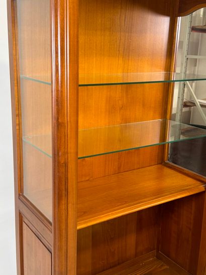 Moulded cherrywood display cabinet opening...