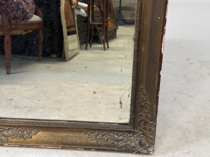 Wood and gilded stucco mirror with foliate...