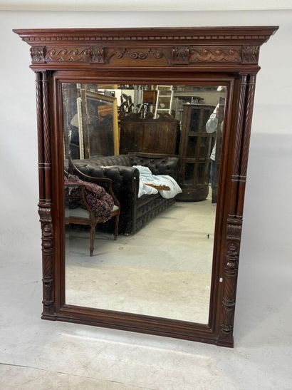 Large molded and carved wood mirror with...