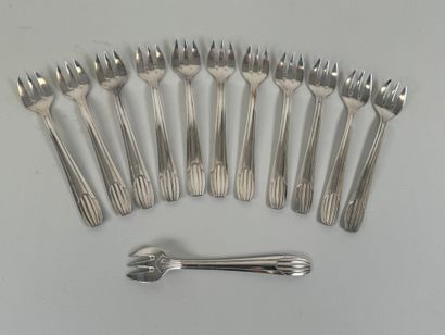 Twelve silver-plated oyster forks, fillet...