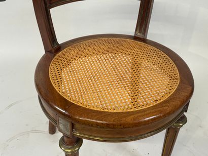 Desk armchair in molded wood and brass, with...